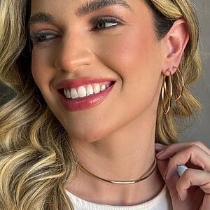 Gold hoop earrings paired with a sleek choker necklace, hypoallergenic semi-jewelry plated in 18k gold for lasting shine and elegance.