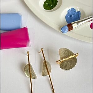 Golden Abstract Art Jewelry Set featuring 18k gold-plated asymmetrical earrings and matching statement ring