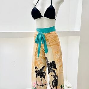 Tropical envelope pants with wrap waist and palm print by Fashion Brasil Sun and Sea, beach and resort wear.