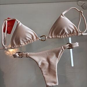 Textured sand‑tone two‑piece bikini with triangle top and side ring details, Fashion Brasil Sun and Sea.