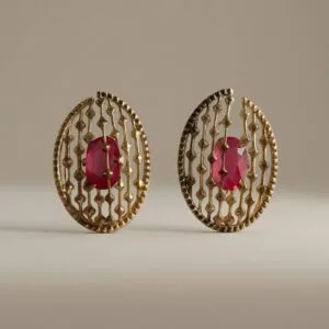Gold-tone earrings with pink sapphire center stones and delicate openwork details, symbolizing love and elegance, designed as a meaningful Mother’s Day jewelry gift by Madu Joia Rara.