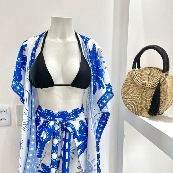 Ocean blue two‑piece pareo set with a lightweight flowing fabric, inspired by Brazilian beachwear and designed for summer, sun, and seaside fashion by Fashion Brasil.