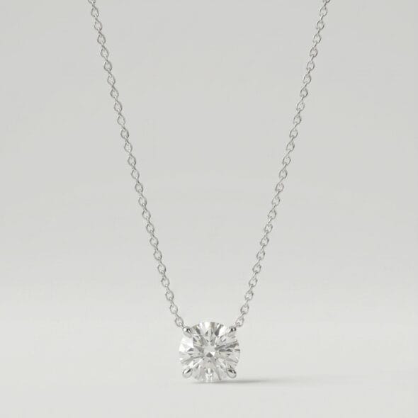 Pure Brilliance solitaire necklace by Madu Joia Rara featuring a round brilliant‑cut stone on a delicate silver‑tone chain