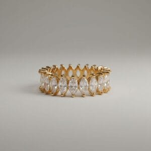 Royal Marquise eternity ring by Madu Joia Rara featuring marquise‑cut clear stones set in a polished gold‑tone band.