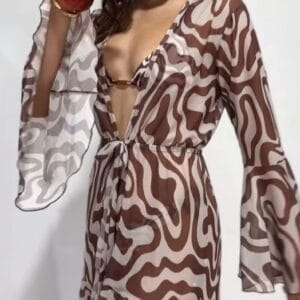 Long printed beach cover‑up dress with flowing silhouette and wide sleeves, Fashion Brasil Sun and Sea.