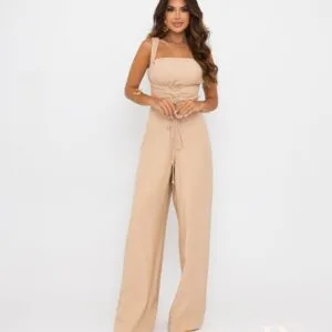 Beige corset‑style wide‑leg jumpsuit with structured bodice, Fashion Brasil Sun and Sea.