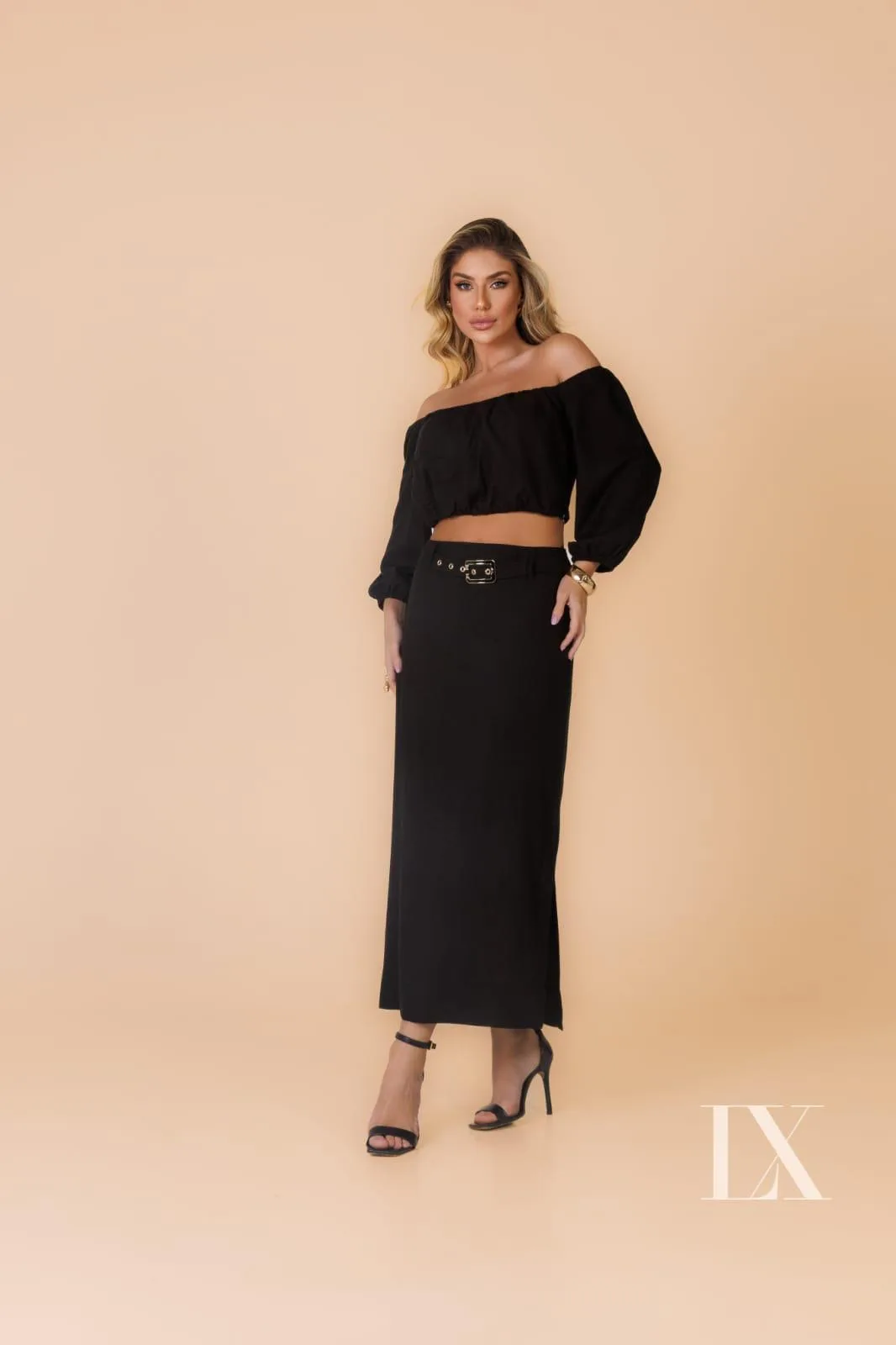 Black off‑shoulder long dress with sleek silhouette, Fashion Brasil Sun and Sea.