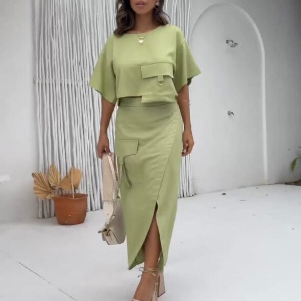 Sage green structured two‑piece set with cropped top and midi skirt, Fashion Brasil Sun and Sea.