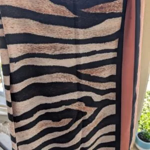 Zebra print long sarong beach wrap with neutral tones and lightweight fabric, Fashion Brasil Sun and Sea.