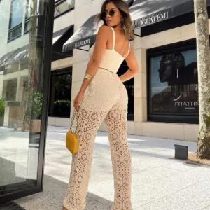Beige crochet wide‑leg jumpsuit with resort style silhouette, Fashion Brasil Sun and Sea.