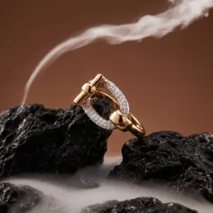 Infinite Grace Ring by Madu Joia Rara featuring a gold link-inspired design with pavé crystal detailing.