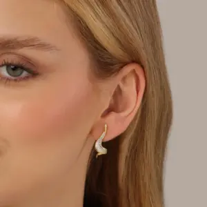 Mari Semijoias organic curved earrings with sparkling zirconia stones and 18K gold-plated finish