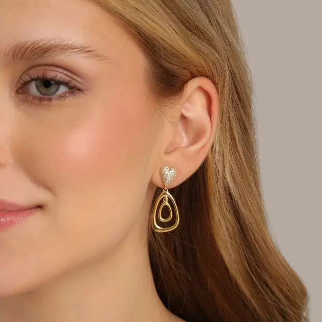 mari semijoias geometric heart drop earrings lifestyle | Heart & Harmony Drop Earrings - Mari Semijoias Mari Semijoias heart drop earrings with crystal zirconia stones and geometric open pendant