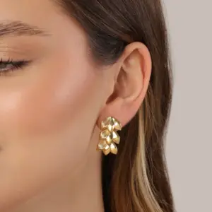 Mari Semijoias 18K gold-plated leaf earrings with overlapping textured leaf design