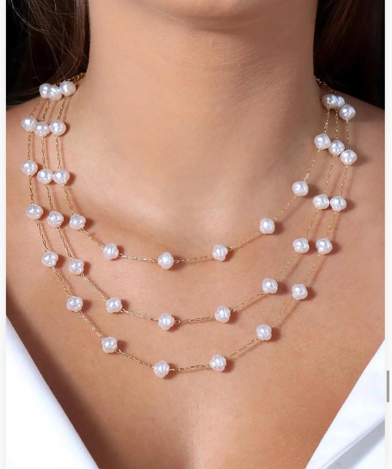 mari semijoias baroque pearl layers necklace front | Baroque Pearl Layers Necklace - Mari Semijoias Mari Semijoias Baroque Pearl Layers Necklace with three strands of freshwater pearls and gold-tone chain