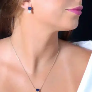 Mari Semijoias Royal Sapphire Pearl Jewelry Set with matching necklace and earrings featuring royal blue rectangular stones and freshwater pearls
